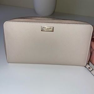 Cream zip up Kate spade wallet. Large wallet.